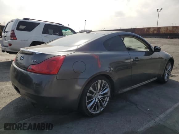 ✅ 2013 Infiniti G37 Journey • VIN: JN1CV6EK5DM921871 • Лот: 80912915. Опубликован ранее на Copart с пробегом 100 857 миль. Бесплатный доступ к архиву аукционных продаж из США и подробный отчёт об истории автомобиля на DreamBid. Изображение 3.