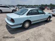 ✅ 1992 Oldsmobile 88 • VIN: 1G3HN53L4NH348979 • Lot: 59209184. Wystawiony na Copart z przebiegiem 144 820 mil. Bezpłatny archiwum sprzedaży aukcyjnych z USA i szczegółowy raport historii pojazdu na DreamBid. Zdjęcie 3.