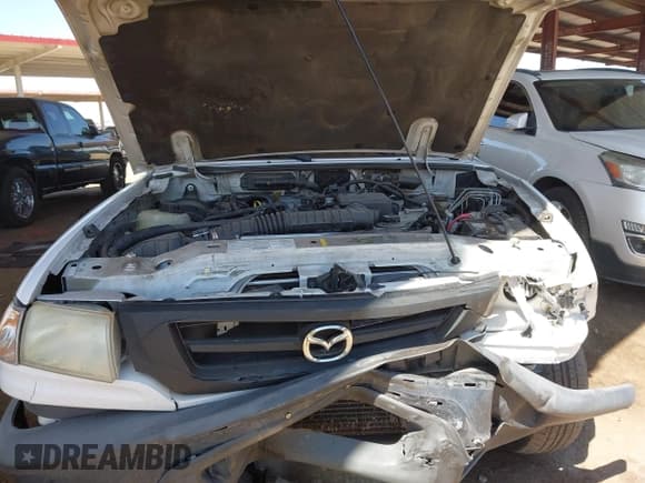 ✅ 2003 Mazda B-Series SX • VIN: 4F4YR12D43TM09711 • Лот: 42265629. Опубликован ранее на IAAI с пробегом 116 319 миль. Бесплатный доступ к архиву аукционных продаж из США и подробный отчёт об истории автомобиля на DreamBid. Изображение 10.