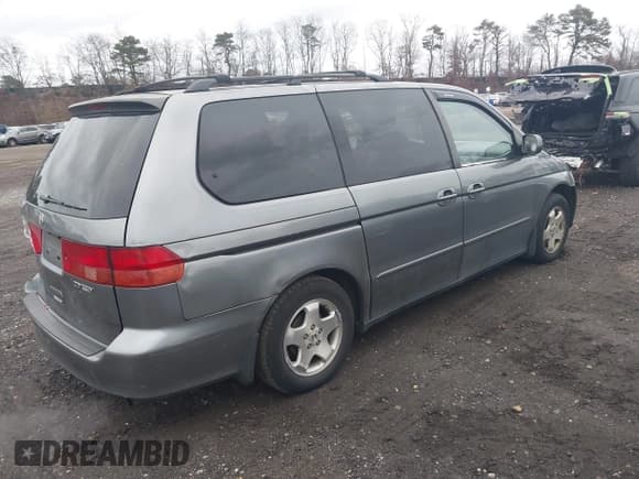 ✅ 2001 Honda Odyssey EX • VIN: 2HKRL18661H618490 • Lot: 43773737. Listed on IAAI with 141,985 mi. Free auction sales archive from the USA and detailed vehicle history report at DreamBid. Image 4.