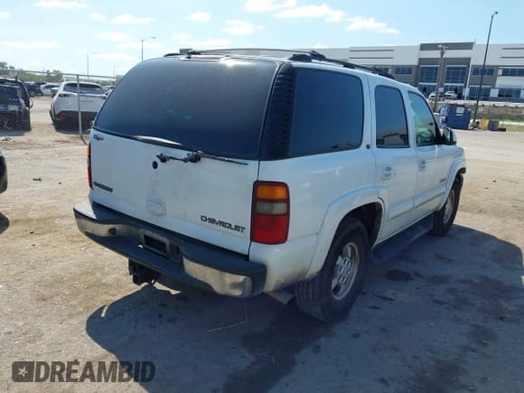 ✅ 2002 Chevrolet Tahoe LT • VIN: 1GNEC13Z32J335075 • Lot: 43088100. Listed on IAAI with 232,322 mi. Free auction sales archive from the USA and detailed vehicle history report at DreamBid. Image 4.