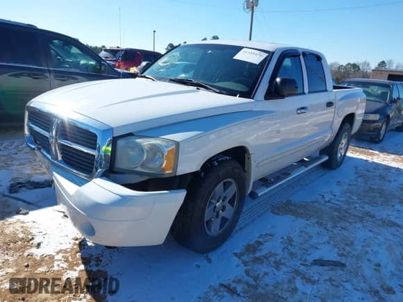 2005 Dodge Dakota Laramie with VIN 1D7HE58N35S138912, listed as a IAAI auction lot 41359470 with 263,136 mi miles and . Bid and sale history available at DreamBid. Image 2.