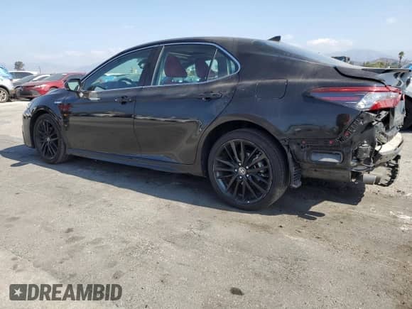 2021 Toyota Camry Hybrid XSE с VIN 4T1K31AK5MU549676, выставлен на аукционе Copart как лот 81924375 с пробегом 83 653 миль миль и Списание • Salvage title. История ставок и продаж доступна на DreamBid. Изображение 2.