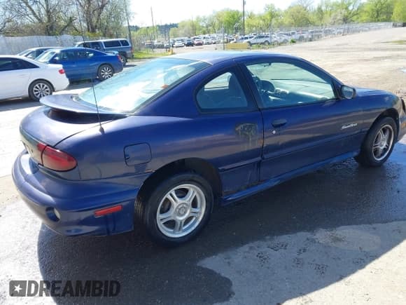 ✅ 2002 Pontiac Sunfire SE • VIN: 1G2JB124927248928 • Lot: 42185285. Listed on IAAI with Not provided. Free auction sales archive from the USA and detailed vehicle history report at DreamBid. Image 4.