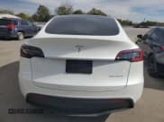 ✅ 2024 Tesla Model Y Long Range • VIN: 7SAYGAEEXRF981884 • Lot: 82370495. Listed on Copart with 17,713 mi. Free auction sales archive from the USA and detailed vehicle history report at DreamBid. Image 6.