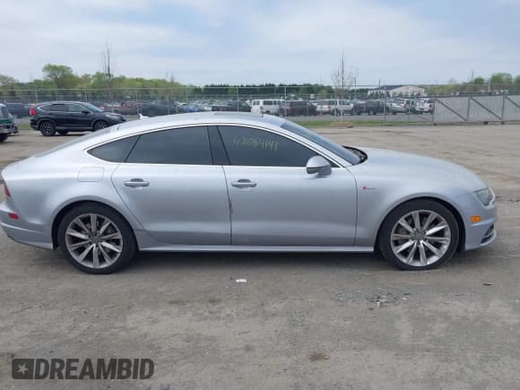 ✅ 2016 Audi A7 Prestige • VIN: WAU2GAFC6GN007637 • Lot: 42084141. Wystawiony na IAAI z przebiegiem 131 213 mil. Bezpłatny archiwum sprzedaży aukcyjnych z USA i szczegółowy raport historii pojazdu na DreamBid. Zdjęcie 13.
