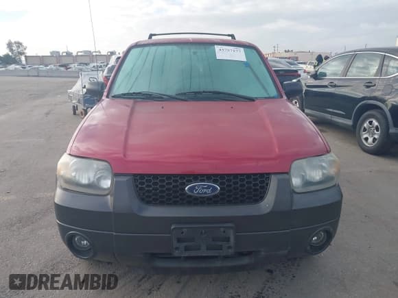 ✅ 2005 Ford Escape XLT • VIN: 1FMCU03105DA26924 • Lot: 43757177. Listed on IAAI with 198,875 mi. Free auction sales archive from the USA and detailed vehicle history report at DreamBid. Image 12.