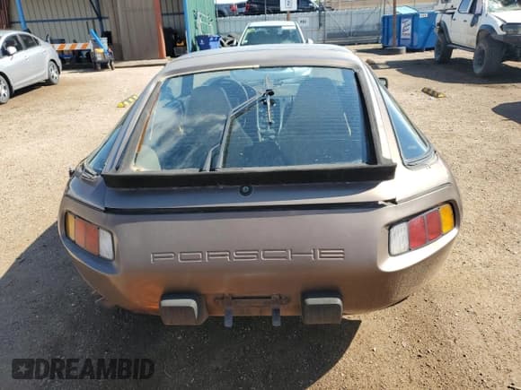 ✅ 1984 Porsche 928 • VIN: WP0JB0929ES860736 • Lot: 63927165. Wystawiony na Copart z przebiegiem 125 989 mil. Bezpłatny archiwum sprzedaży aukcyjnych z USA i szczegółowy raport historii pojazdu na DreamBid. Zdjęcie 6.