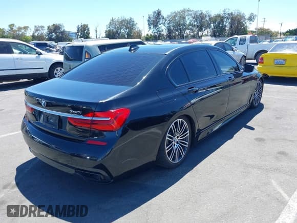 ✅ 2019 BMW 7 Series 740i • VIN: WBA7E2C55KB216529 • Lot: 42837792. Listed on IAAI with 81,573 mi. Free auction sales archive from the USA and detailed vehicle history report at DreamBid. Image 4.