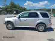 2010 Mercury Mariner Premier z VIN 4M2CN9HGXAKJ16116, wystawiony jako IAAI lot #43140056 z przebiegiem 194 370 mil mil oraz . Historia ofert i sprzedaży dostępna na DreamBid. Obrazek 15.