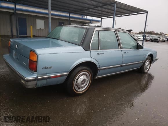 ✅ 1986 Oldsmobile 88 • VIN: 1G3HY6931G1848954 • Lot: 81999144. Wystawiony na Copart z przebiegiem Nie podano. Bezpłatny archiwum sprzedaży aukcyjnych z USA i szczegółowy raport historii pojazdu na DreamBid. Zdjęcie 3.