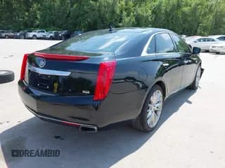 ✅ 2013 Cadillac XTS Platinum • VIN: 2G61V5S3XD9153199 • Лот: 42999791. Опубликован ранее на IAAI с пробегом 95 614 миль. Бесплатный доступ к архиву аукционных продаж из США и подробный отчёт об истории автомобиля на DreamBid. Изображение 4.