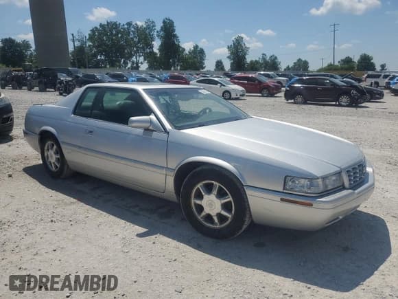 ✅ 2002 Cadillac Eldorado Touring • VIN: 1G6ET12942B102314 • Lot: 62061185. Listed on Copart with 64,069 mi. Free auction sales archive from the USA and detailed vehicle history report at DreamBid. Image 4.