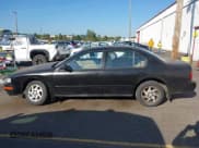 ✅ 1996 Nissan Maxima GXE • VIN: JN1CA21DXTT105853 • Лот: 43261472. Опубликован ранее на IAAI с пробегом 244 001 миль. Бесплатный доступ к архиву аукционных продаж из США и подробный отчёт об истории автомобиля на DreamBid. Изображение 14.