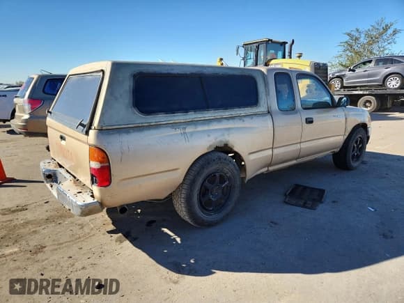 ✅ 1996 Toyota Tacoma • VIN: 4TAVN52N7TZ133900 • Lot: 90624055. Listed on Copart with 304,969 mi. Free auction sales archive from the USA and detailed vehicle history report at DreamBid. Image 3.