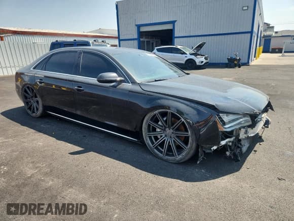 ✅ 2014 Audi A8 3.0T • VIN: WAURGAFD4EN005874 • Лот: 65255595. Опубликован ранее на Copart с пробегом Не указан. Бесплатный доступ к архиву аукционных продаж из США и подробный отчёт об истории автомобиля на DreamBid. Изображение 4.