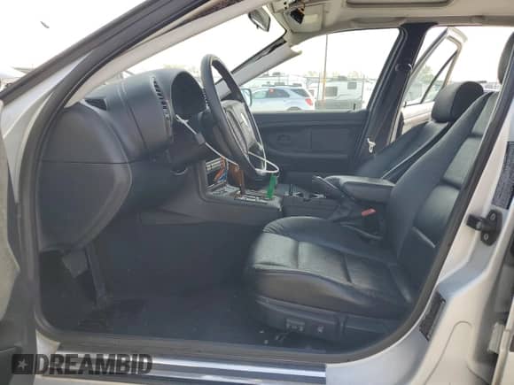 1998 BMW 3 Series 328i with VIN WBACD4322WAV65078, listed as a Copart auction lot 48259125 with 158,640 mi miles and Salvage title. Bid and sale history available at DreamBid. Image 7.