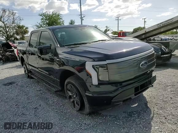 ✅ 2023 Ford F-150 Lightning Lariat • VIN: 1FTVW1EL7PWG20719 • Lot: 85266825. Listed on Copart with 66,237 mi. Free auction sales archive from the USA and detailed vehicle history report at DreamBid. Image 13.