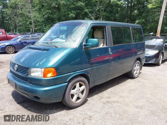 ✅ 2002 Volkswagen EuroVan GLS • VIN: WV2KB47032H090623 • Lot: 42750101. Listed on IAAI with 237,862 mi. Free auction sales archive from the USA and detailed vehicle history report at DreamBid. Image 2.