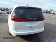 ✅ 2023 Chrysler Pacifica Touring • VIN: 2C4RC1FG5PR610811 • Lot: 43733563. Listed on IAAI with 55,492 mi. Free auction sales archive from the USA and detailed vehicle history report at DreamBid. Image 16.