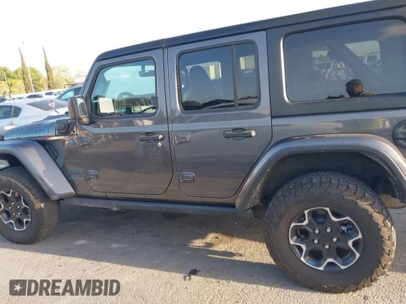 ✅ 2023 Jeep Wrangler Rubicon • VIN: 1C4JJXR67PW662277 • Лот: 41950065. Опубликован ранее на IAAI с пробегом 35 714 миль. Бесплатный доступ к архиву аукционных продаж из США и подробный отчёт об истории автомобиля на DreamBid. Изображение 14.