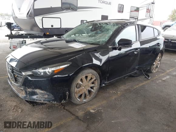 ✅ 2018 Mazda 3 Touring • VIN: 3MZBN1L3XJM165717 • Lot: 43094476. Listed on IAAI with 69,270 mi. Free auction sales archive from the USA and detailed vehicle history report at DreamBid. Image 2.