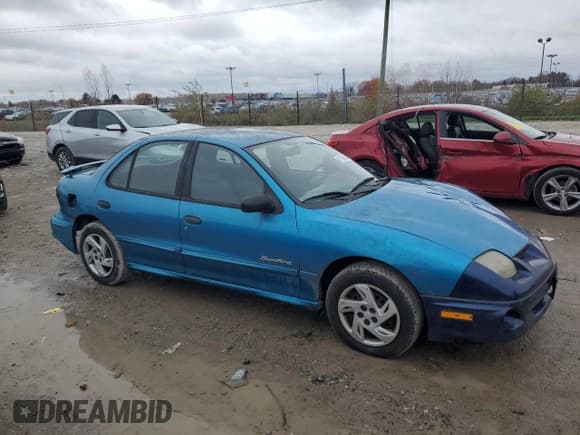 ✅ 2000 Pontiac Sunfire SE • VIN: 1G2JB5249Y7282240 • Lot: 81605804. Listed on Copart with 149,866 mi. Free auction sales archive from the USA and detailed vehicle history report at DreamBid. Image 4.