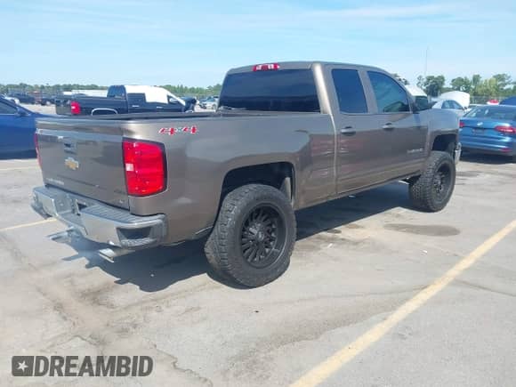 2015 Chevrolet Silverado 1500 LT z VIN 1GCVKREC6FZ161108, wystawiony jako IAAI lot #43074690 z przebiegiem 198 960 mil mil oraz . Historia ofert i sprzedaży dostępna na DreamBid. Obrazek 4.