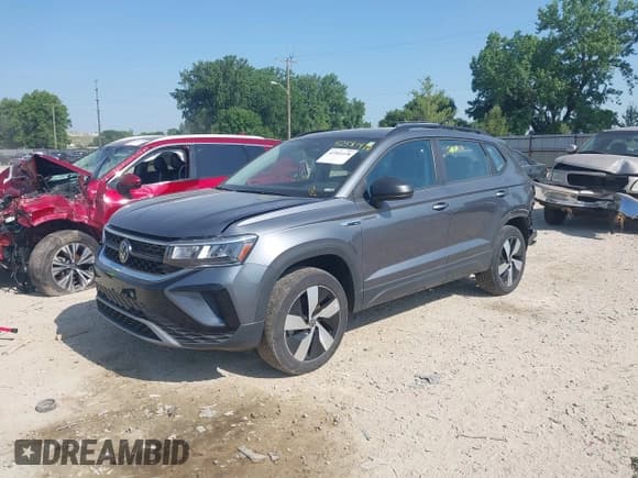 ✅ 2023 Volkswagen Taos S • VIN: 3VVMX7B22PM364322 • Лот: 42581478. Опубликован ранее на IAAI с пробегом 26 463 миль. Бесплатный доступ к архиву аукционных продаж из США и подробный отчёт об истории автомобиля на DreamBid. Изображение 17.