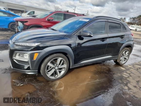 ✅ 2021 Hyundai Kona Ultimate • VIN: KM8K5CA59MU660831 • Лот: 90657275. Опубликован ранее на Copart с пробегом 83 370 миль. Бесплатный доступ к архиву аукционных продаж из США и подробный отчёт об истории автомобиля на DreamBid. Изображение 1.