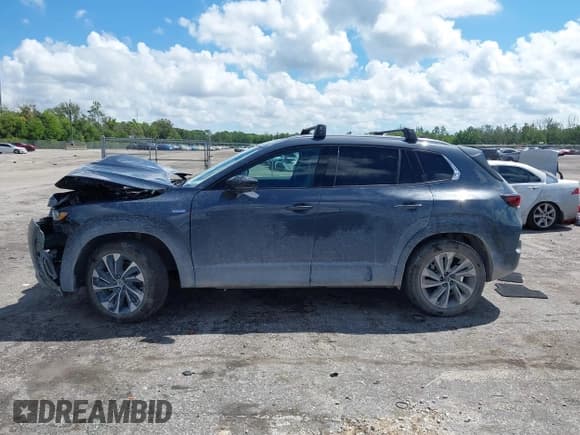 ✅ 2025 Mazda CX-50 Hybrid Premium Plus Package • VIN: 7MMVAAEW9SN127423 • Lot: 43322908. Wystawiony na IAAI z przebiegiem 2 928 mil. Bezpłatny archiwum sprzedaży aukcyjnych z USA i szczegółowy raport historii pojazdu na DreamBid. Zdjęcie 14.