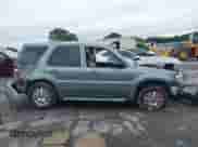 2006 Mercury Mariner Luxury with VIN 4M2YU57196KJ01063, listed as a IAAI auction lot 42907986 with Not provided miles and . Bid and sale history available at DreamBid. Image 13.