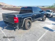 ✅ 2015 GMC Sierra 1500 Denali • VIN: 3GTU2WEJ6FG512222 • Lot: 42728975. Listed on IAAI with 86,679 mi. Free auction sales archive from the USA and detailed vehicle history report at DreamBid. Image 4.