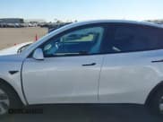 ✅ 2023 Tesla Model Y Long Range • VIN: 7SAYGDEE1PF826879 • Lot: 43393771. Listed on IAAI with 35,091 mi. Free auction sales archive from the USA and detailed vehicle history report at DreamBid. Image 14.