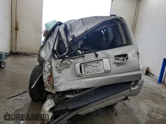 ✅ 2002 Isuzu Rodeo • VIN: 4S2DM58W924331185 • Лот: 62650715. Опубликован ранее на Copart с пробегом Не указан. Бесплатный доступ к архиву аукционных продаж из США и подробный отчёт об истории автомобиля на DreamBid. Изображение 6.