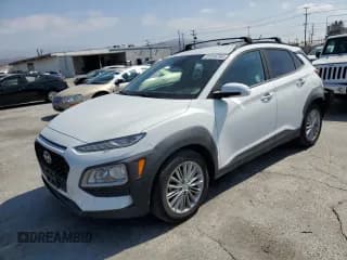 ✅ 2020 Hyundai Kona SEL • VIN: KM8K22AA2LU411351 • Лот: 81916705. Опубликован ранее на Copart с пробегом 126 665 миль. Бесплатный доступ к архиву аукционных продаж из США и подробный отчёт об истории автомобиля на DreamBid. Изображение 1.