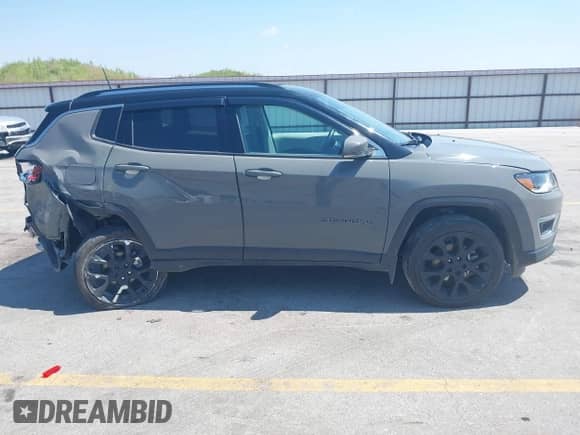 2021 Jeep Compass Limited with VIN 3C4NJDCBXMT596279, listed as a IAAI auction lot 42982613 with 52,886 mi miles and . Bid and sale history available at DreamBid. Image 13.