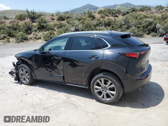 ✅ 2024 Mazda CX-30 S Premium • VIN: 3MVDMBDMXRM682702 • Lot: 59981805. Listed on Copart with 21,505 mi. Free auction sales archive from the USA and detailed vehicle history report at DreamBid. Image 2.