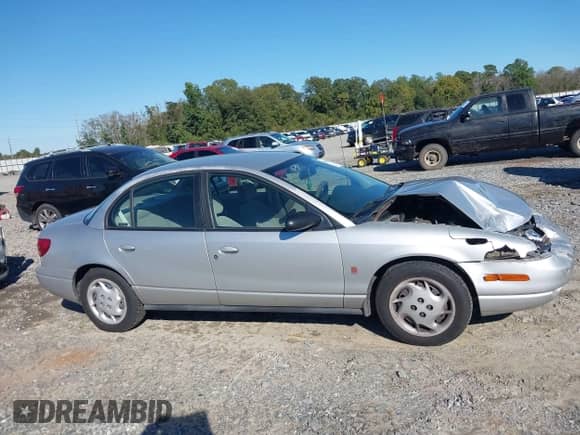 2002 Saturn SL с VIN 1G8ZK52702Z243549, выставлен на аукционе IAAI как лот 43488210 с пробегом 155 263 миль миль и . История ставок и продаж доступна на DreamBid. Изображение 13.