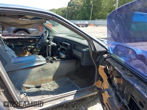 ✅ 1988 Pontiac Fiero • VIN: 1G2PE11R7JP201894 • Lot: 42888841. Listed on IAAI with Not provided. Free auction sales archive from the USA and detailed vehicle history report at DreamBid. Image 5.