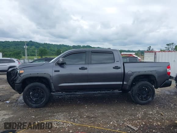 ✅ 2021 Toyota Tundra SR5 • VIN: 5TFDY5F1XMX025833 • Lot: 42442498. Listed on IAAI with 70,419 mi. Free auction sales archive from the USA and detailed vehicle history report at DreamBid. Image 14.