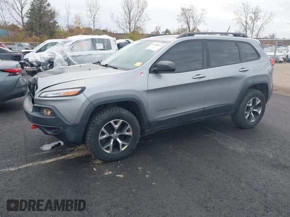 ✅ 2014 Jeep Cherokee Trailhawk • VIN: 1C4PJMBS7EW127804 • Lot: 43568411. Wystawiony na IAAI z przebiegiem 185 120 mil. Bezpłatny archiwum sprzedaży aukcyjnych z USA i szczegółowy raport historii pojazdu na DreamBid. Zdjęcie 17.
