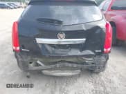 ✅ 2015 Cadillac SRX • VIN: 3GYFNAE38FS593171 • Lot: 42274159. Wystawiony na IAAI z przebiegiem 104 049 mil. Bezpłatny archiwum sprzedaży aukcyjnych z USA i szczegółowy raport historii pojazdu na DreamBid. Zdjęcie 18.