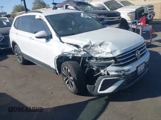 ✅ 2023 Volkswagen Tiguan S • VIN: 3VVRB7AX1PM049965 • Lot: 43588620. Listed on IAAI with 45,249 mi. Free auction sales archive from the USA and detailed vehicle history report at DreamBid. Image 1.