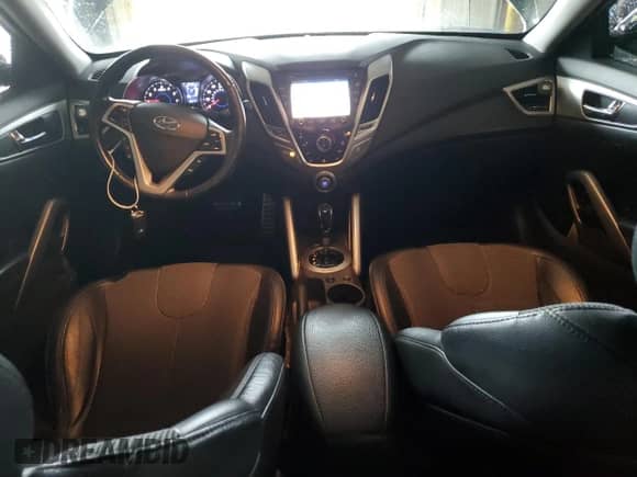 2012 Hyundai Veloster w/Red Int z VIN KMHTC6AD1CU054411, wystawiony jako Copart lot #73357964 z przebiegiem 12 486 mil mil oraz Szkoda całkowita • Salvage title. Historia ofert i sprzedaży dostępna na DreamBid. Obrazek 8.