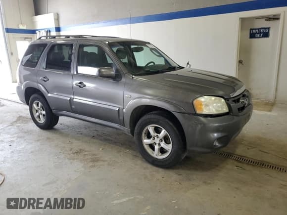 ✅ 2005 Mazda Tribute S • VIN: 4F2CZ96115KM59847 • Lot: 67740144. Listed on Copart with 217,053 mi. Free auction sales archive from the USA and detailed vehicle history report at DreamBid. Image 4.
