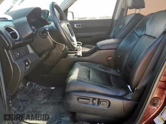 ✅ 2012 Honda Pilot EX-L • VIN: 5FNYF3H6XCB022976 • Lot: 52588085. Listed on Copart with 141,019 mi. Free auction sales archive from the USA and detailed vehicle history report at DreamBid. Image 7.