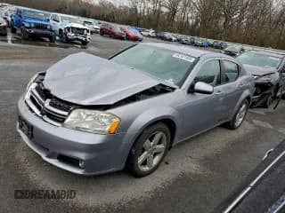 ✅ 2013 Dodge Avenger SXT • VIN: 1C3CDZCB8DN661422 • Lot: 94101485. Listed on Copart with 123,559 mi. Free auction sales archive from the USA and detailed vehicle history report at DreamBid. Image 1.