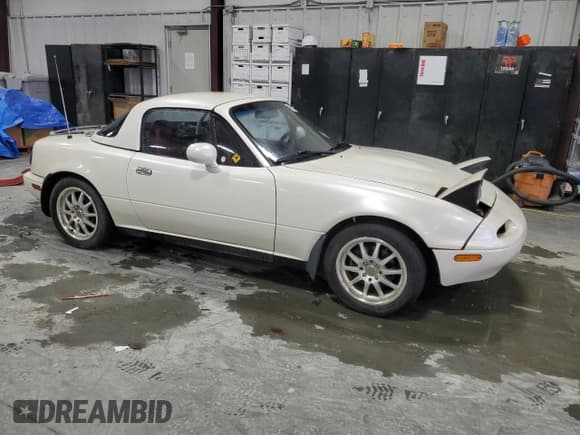 ✅ 1995 Mazda MX-5 Miata • VIN: JM1NA3538S0617303 • Lot: 87312535. Listed on Copart with 385,829 mi. Free auction sales archive from the USA and detailed vehicle history report at DreamBid. Image 4.