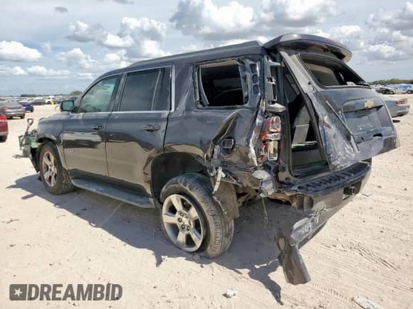 2015 Chevrolet Tahoe LT с VIN 1GNSCBKC2FR308446, выставлен на аукционе Copart как лот 69120375 с пробегом 169 986 миль миль и Списание • Salvage title. История ставок и продаж доступна на DreamBid. Изображение 2.